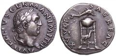 Vitellius AR Denarius. Rome, April-December 69 AD. A VITELLIVS GERMAN IMP TR P, laureate bust right / XV VIR SACR FAC, dolphin set over tripod, raven below. RIC 86, BMC 17, C. 3.23g, 18mm. FLEUR DE CO