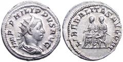 Philip II, as Augustus, AR Antoninianus. 247 AD. IMP PHILIPPVS AVG, radiate draped bust right / LIBERALITAS AVGG III, Philip I and Philip II seated left on curule chairs distributing money. RIC 230, R