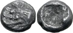 Greek Kingdom of Lydia, Kroisos AR 1/24 Stater. Sardes, circa 561-546 BC. Confronted foreparts of lion to right and bull to left / Incuse punch. GRPC Lydia S10; SNG Tübingen 3652-3. 0.44g, 6mm. Very F