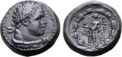 Greek Lydia, Sardes Æ 17mm. Circa 245/220-100 BC. Laureate bust of Herakles to right, lion skin around neck / Apollo standing to left, holding bird and branch; ΣAPΔIANΩN to right, monogram to left; al