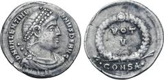Roman Imperial Valentinian I AR Siliqua. Constantinople, AD 364-367. D N VALENTINIANVS P F AVG, pearl-diademed, draped and cuirassed bust to right / VOT V within wreath; •CONSA• in exergue. RIC IX 13a