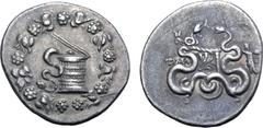 Greek Lydia, Tralleis AR Cistophoric Tetradrachm. Circa 155-145 BC. Serpent emerging from cista mystica; all within ivy wreath / Two serpents entwined around bow and bowcase; TPAΛ to left, Athena Prom