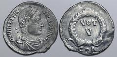 ROMAN IMPERIAL Valentinian I AR Siliqua. Constantinople, AD 364-367. D N VALENTINIANVS P F AVG, pearl-diademed, draped, and cuirassed bust to right / VOT V within wreath; C•A in exergue. RIC IX 13a.6;