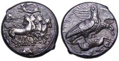Sicily, Akragas AR Tetradrachm. Circa 409-406 BC. Charioteer driving fast quadriga right; above, Nike flying left, crowning charioteer; crab in exergue / Two eagles standing right on dead hare lying o