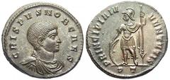 Crispus Æ Follis. Ticinum, 317 AD. CRISPVS NOB CAES, draped bust right / PRINCIPIA IV-VENTVTIS, Prince helmeted, in military dress, standing left, holding reversed spear, right hand on shield set on g