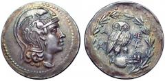 Attica, Athens AR Tetradrachm. New Style Coinage, circa 154-3 BC. Head of Athena right, wearing crested Attic helmet decorated with vine tendril and Pegasos / Owl standing right, head facing, on ampho