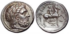 Kingdom of Macedon. Philip II AR Tetradrachm. Amphipolis, circa 323-315 BC. Struck under Philip III. Laureate head of Zeus right / Nude youth on horseback right, holding palm in right hand and reins i