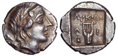 Lycia, Limyra as a member of the Lycian League AR Drachm. 167-81 BC. Laureate head of Apollo right, bow and quiver over shoulder / City initials Λ-Ι on either side of a kithara, ΛVKIΩΝ above, helmet t