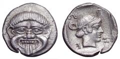 Macedon, Neapolis AR Hemidrachm. Macedon, Neapolis AR Hemidrachm. Circa 450-400 BC. Gorgoneion with protuding tongue / Head of Artemis Parthenos right, hair rolled up and tied in taenia, NEΩΠ around. 