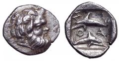 Islands off Thrace, Thasos AR Hemiobol. Islands off Thrace, Thasos AR Hemiobol. Circa 411-404 BC. Head of satyr right, with full head of hair / Two dolphins swimming in opposite direction, ΘAΣI around