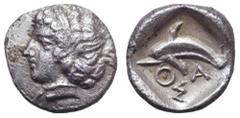 Islands off Thrace, Thasos AR Hemiobol. Islands off Thrace, Thasos AR Hemiobol. Circa 411-404 BC. Female head left, wearing diadem and necklace / Dolphin leaping left, ΘΑΣ below. 0.28g, 9mm, 12h. Extr