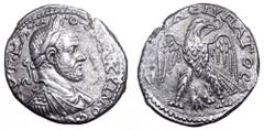 Macrinus AR Tetradrachm of Phoenicia, Aradus. Macrinus AR Tetradrachm of Phoenicia, Aradus. AD 217-8. AYT KA M O C MAKPINOC CE, laureate, draped and cuirassed bust right / DHMAPX EX YPATOCA, eagle sta