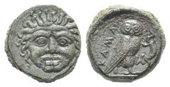 Sicily, Kamarina Æ Tetras. Sicily, Kamarina Æ Tetras. c. 420-405. Gorgoneion, tongue protruding / Owl standing r., grasping lizard; three pellets in exergue. CNS III, 8; SNG ANS 1221-4. 3.49g, 14mm, 6