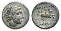 Kingdom of Macedon. Philip II Æ 1/4 Unit. Kingdom of Macedon. Philip II Æ 1/4 Unit. Miletos c. 323. Male head r., wearing tainia / Youth on horseback r.; monogram above. SNG ANS 1005. 1.53g, 11mm, 9h.