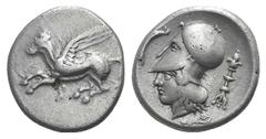 Corinthia, Corinth AR Stater. Corinthia, Corinth AR Stater. c. 400-375. Pegasos flying l. / Helmeted head of Athena r., dolphin above l.; thymaterion behind; ivy branch below. Ravel 835; BMC 166. 8.43