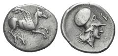 Corinthia, Corinth AR Stater. Corinthia, Corinth AR Stater. c. 405-345. Pegasos flying r. / Helmeted head of Athena r., dolphin above r.; retrograde Σ behind. Ravel 921; BMC 387. 8.40g, 22mm, 6h. Tone