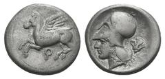 Corinthia, Corinth AR Stater. Corinthia, Corinth AR Stater. c. 405-345. Pegasos flying l. / Helmeted head of Athena l., rose behind. Ravel 997; BMC 387. 8.26g, 22mm, 3h. Toned VF