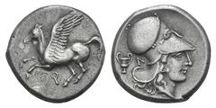 Corinthia, Corinth AR Stater. Corinthia, Corinth AR Stater. c. 375-300. Pegasos flying l. / Helmeted head of Athena r.; kantharos and N behind. Ravel 1061; BMC 374. 8.55g, 20mm, 8h. Beautifully toned 