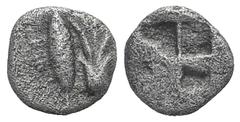 Mysia, Kyzikos AR Hemiobol. Mysia, Kyzikos AR Hemiobol. c. 550-500. Lotus flower; tunny to r. / Quadripartite incuse square. Cf. CNG 69, lot 347. 0.40g, 7mm. Toned VF