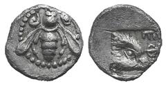 Ionia, Ephesos AR Tetartemorion. Ionia, Ephesos AR Tetartemorion. c. 550-500. Bee with curved wings and coiled tendrils / Eagle’s head r. within incuse square. Karwiese series IV; SNG Kayhan 126. 0.17