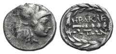 Ionia, Herakleia ad Latmon AR Hemidrachm. Ionia, Herakleia ad Latmon AR Hemidrachm. After 165. Helmeted head of Athena r. / Club within wreath. SNG Copenhagen 782; SNG vA 1979. 2.40g, 14mm, 6h. F/VF