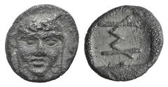 Ionia, Kolophon AR Hemiobol. Ionia, Kolophon AR Hemiobol. c. 450-410. Facing head of Apollo / Monogram (mark of value) within incuse rectangle. Milne, Colophon 5; Klein 397. 0.47g, 8mm, 6h. Toned VF