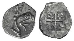 Ionia, Phokaia AR Tetartemorion. Ionia, Phokaia AR Tetartemorion. late 6th C. BC. Head of griffin r. / Four-part incuse square. SNG Copenhagen Supp. 339; SNG vA 7938. 0.20g, 8mm. Toned EF