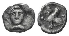 Cilicia, uncertain mint. AR Tetartemorion Cilicia, uncertain mint. AR Tetartemorion 4th C. BC. Female head facing / Sphinx seated l., raising r. paw. Troxell-Kagan 20. 0.19g, 6mm, 3h. Toned VF