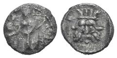Samaria AR Hemiobol. Samaria AR Hemiobol. c. 375-333. Draped male figure standing l., holding long sceptre / Facing head of Bes. Cf. Meshorer- Qedar 120. 0.32g, 8mm, 3h. Toned, good VF