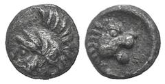 Cilicia, uncertain mint. AR Tetartemorion. Cilicia, uncertain mint. AR Tetartemorion. Early-mid 4th C. BC. Bearded and helmeted head l. / Head of lion r. Troxell - Kagan 15. 0.19g, 6mm, 4h. Toned VF