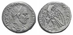 Macrinus AR Tetradrachm of Carrhae, Mesopotamia. Macrinus AR Tetradrachm of Carrhae, Mesopotamia. 217-218. Radiate, draped and cuirassed bust r., seen from behind / Eagle standing facing, head r., hol