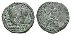 Macrinus and Diadumenian Æ28 of Marcianopolis, Moesia Inferior. Macrinus and Diadumenian Æ28 of Marcianopolis, Moesia Inferior. AD 217-218. Laureate head of Macrinus facing r., vis-vis bare head of Di