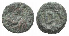 Vandals in Carthage Æ Nummus. Vandals in Carthage Æ Nummus. Gunthamund, 484-496. Pearl-diademed, draped and cuirassed bust r. / D within wreath. MEC 1, 13-14. 0.79g, 8mm, 9h. Rare. Dark green patina, 