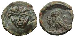 Sicily, Kamarina Æ Tetras. Circa 420-405 BC. Gorgoneion with tongue protruding / Owl standing r., grasping lizard. Westermark & Jenkins 195.14; CNS III, p. 58, 26; HGC 2, 547. 3.16, 14mm, 6h. Extremel