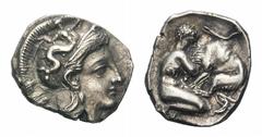 Calabria, Tarentum AR Diobol.Calabria, Tarentum AR Diobol. Circa 380-325 BC. Head of Athena right, wearing crested helmet decorated with Skylla / Herakles kneeling right, holding club, fighting the Ne