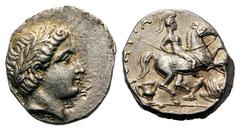 Kings of Paeonia. Patraos AR Tetradrachm.Kings of Paeonia. Patraos AR Tetradrachm. Damastion, circa 335-315 BC. Laureate head of Apollo right / Warrior on rearing horse right, spearing enemy who defen