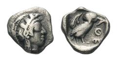 Attica, Athens AR Hemiobol.Attica, Athens AR Hemiobol. Circa 454-404 BC. Helmeted head of Athena right / Owl standing right, head facing; olive sprig behind; all within incuse square. Kroll 14; SNG Co