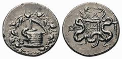 Ionia, Ephesos AR Cistophoric Tetradrachm.Ionia, Ephesos AR Cistophoric Tetradrachm. Dated year 4 = 131/0 BC. Cista mystica with serpent; all within ivy wreath / Bowcase with serpents; Δ above, torch 