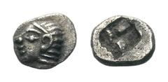 Ionia, Kolophon AR Tetartemorion. Ionia, Kolophon AR Tetartemorion. Circa 530-500 BC Archaic head of Apollo left / Incuse square punch. SNG Kayhan 343; SNG Copenhagen -; SNG von Aulock 1810. 0.19g, 5m