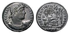 Constantine I Æ Follis.Constantine I Æ Follis. Constantinople, AD 328. Rosette-diademed, draped and cuirassed bust right / Victory with laurel branch and palm branch seated left, head right, captive a