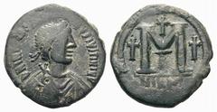 Justin I and Justinian I Æ Follis.Justin I and Justinian I Æ Follis. Nicomedia, 4th April - 1st August AD 527. Pearl-diademed, draped and cuirassed bust right / Large M flanked and surmounted by cross