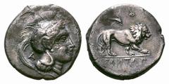 Lucania, Velia AR Didrachm. Lucania, Velia AR Didrachm. Circa 305-290 BC. Head of Athena right, wearing crested Attic helmet decorated with griffin, A behind neck-guard, Φ before chin / Lion standing 