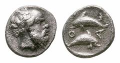 Islands off Thrace, Thasos AR Hemiobol. Islands off Thrace, Thasos AR Hemiobol. Circa 411-404 BC. Head of satyr right, with full head of hair / Two dolphins swimming in opposite direction, ΘAΣI around
