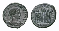 Constantius II Æ Follis. Constantius II Æ Follis. Antioch, AD 330-335. FL IVL CONSTANTIVS NOB C, laureate cuirassed bust right / GLORIA EXERCITVS, two soldiers standing holding spears, shields, and tw