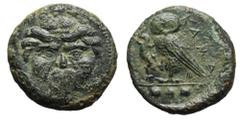 Sicily, Kamarina Æ Tetras. Circa 420-405 BC. Gorgoneion with tongue protruding / Owl standing r., grasping lizard. Westermark & Jenkins 195.14; CNS III, p. 58, 26; HGC 2, 547. 2.84g, 14mm, 2h. Very Fi
