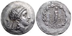 Ionia, Kolophon AR Tetradrachm. Circa 155-145 BC. Laureate head of Apollo right / Apollo Klarios standing right holding filleted branch, right hand placed on lyre, ΚΟΛΟΦΩΝΙΩΝ to left, all within laure