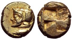 Mysia, Kyzikos EL Hekte. Circa 550-500 BC. Bearded head of Herakles to left, wearing a helmet in the form of the head of a sea monster; below, tunny fish to right / Quadripartite incuse square. Fritze