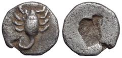 Karia, uncertain mint AR Tetartemorion. Circa 500-450 BC. Scorpion / Incuse punch. Cf. SNG von Aulock 6664. 0.25g, 6mm. Very Fine.