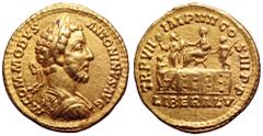 Commodus AV Aureus. Rome, AD 181-182. M COMMODVS ANTONINVS AVG, laureate and cuirassed bust right / TR P VII IMP IIII COS III P P, Commodus seated left on platform between soldier standing left, holdi