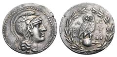 Attica, Athens AR Tetradrachm. New Style Coinage, circa 154-3 BC. Head of Athena right, wearing crested Attic helmet decorated with vine tendril and Pegasos / Owl standing right, head facing, on ampho